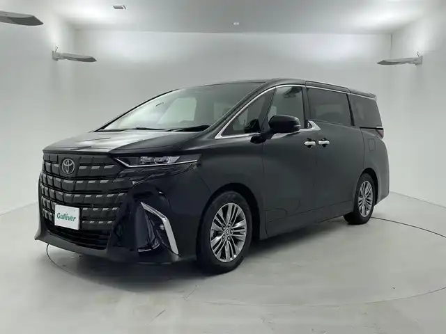 トヨタ アルファード Z 福井県 2024(令6)年 0.9万km ブラック 純正12.3インチディスプレイオーディオ（ナビ付）/-ラジオ・BT・USB・HDMI・フルセグ/パノラミックビューモニター/革シート/左右独立ムーンルーフ/ウッドステアリング/静電式ステアリングスイッチ/カラーヘッドアップディスプレイ/ユニバーサルステップ/オートハイビームアシスト/LEDヘッドライト/純正フォグランプ/2列目エクゼクティブパワーシート/デジタルインナーミラー/パワーバックドア/スマートキー/エンジンプッシュスタート/保証書/スペアキー