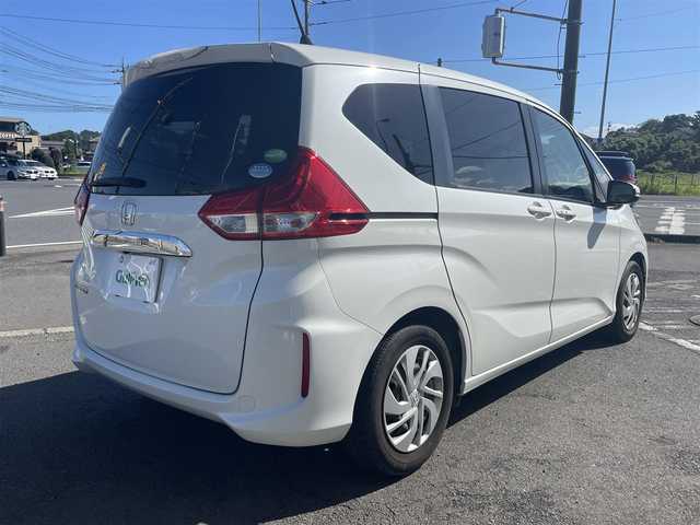 ホンダ フリード G ホンダセンシング 神奈川県 2018(平30)年 3.9万km ホワイトオーキッドパール 保証書/取扱説明書/純正ナビ（VXM-185VFi）/AM・FM・CD・DVD・BT・SD・フルセグTV/バックカメラ/econシステム/追従クルーズコントロール/衝突軽減システム/両側パワースライドドア/フォグランプ/LEDヘッドライト/オートライト/スマートキー/３列シート/ウォークスルー