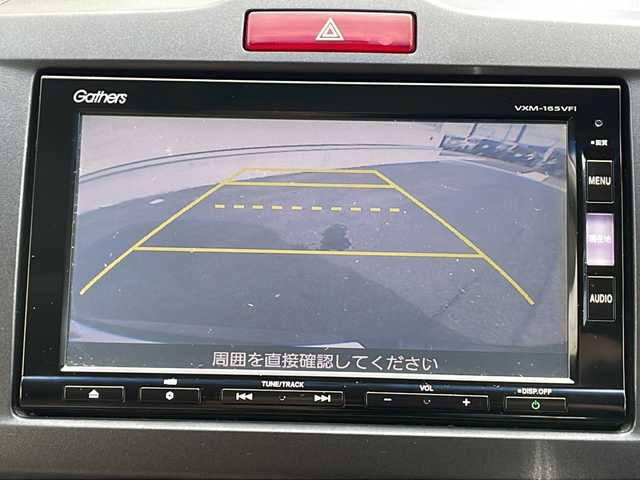 ホンダ フリード ハイブリット プレミアムエディション 長野県 2016(平28)年 11.1万km プレミアムスパークルブラックパール (株)IDOMが運営する【じしゃロン長野店】の自社ローン専用車両になります/こちらは現金またはオートローンご利用時の価格です。自社ローンご希望の方は別途その旨お申付け下さい./社外ナビ（CD/DVD/BT）/バックカメラ/クルーズコントロール/両側パワースライドドア/ステアリングスイッチ/ビルトインETC/前後コーナーセンサー/電動格納ミラー/純正フロアマット/フリップダウンモニター