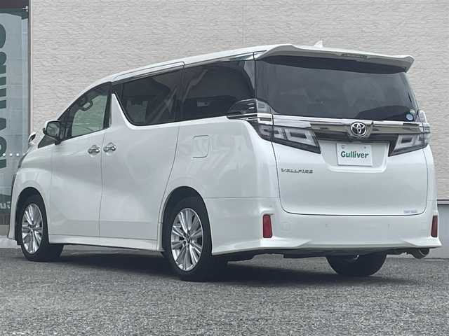 トヨタ ヴェルファイア Z 大阪府 2019(平31)年 6.9万km ホワイトパールクリスタルシャイン ワンオーナー/サンルーフ/純正９インチSDナビ/BT/CD/DVD/USB/SD/TV/バックカメラ/ドライブレコーダー(前/室内)/両側パワースライドドア/追従機能付きクルーズコントロール/レーンキープアシスト/前後コーナーセンサー/オートホールド/YMT製ベージュフロアマット/LEDヘッドライト/フロントフォグ/オートハイビーム/純正18インチAW/100V充電/スペアタイヤ/スペアキー/ETC2.0
