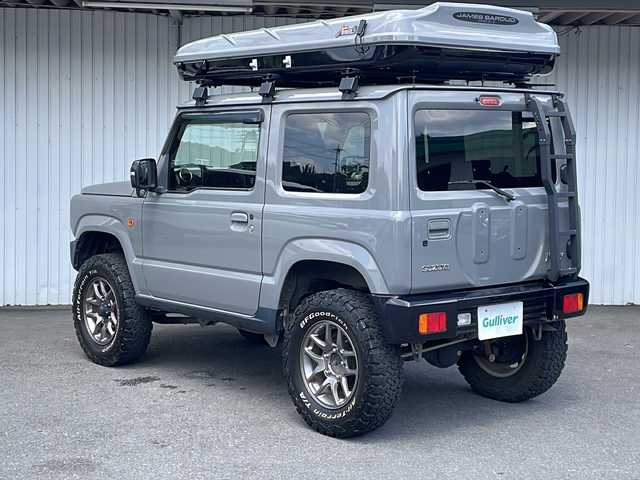 スズキ ジムニー XC 長野県 2019(平31)年 5.3万km ミディアムグレー スズキセーフティレーダー/３インチリフトアップ/ルーフトップテント/ジェームス・パロウド・テント/純正１６インチアルミ/マッドテレーンタイヤ/メモリナビ /バックカメラ/社外グリル/背面ラダー/ワンオーナー