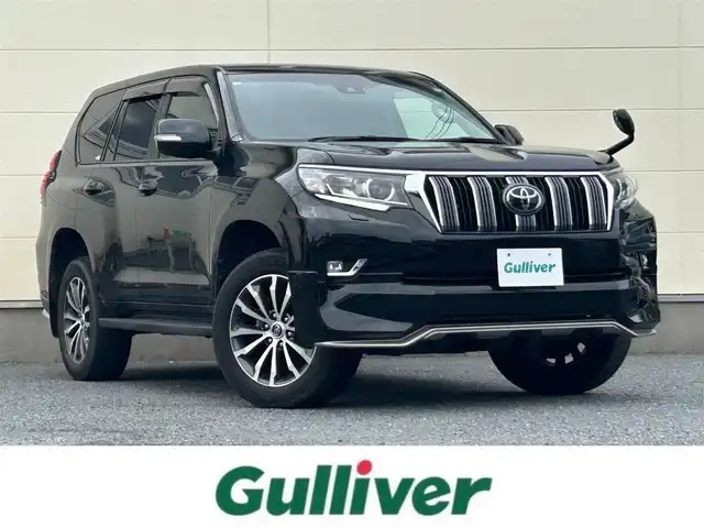 トヨタ ランドクルーザー プラド TX Lパッケージ 茨城県 2020(令2)年 2.8万km アティチュードブラックマイカ 純正ナビ/CD/DVD/BT/HDMI/モデリスタエアロ(フロント・リア)/純正オプション19インチアルミホイール/4WD/バックカメラ/黒革シート/レーダークルーズコントロール/衝突被害軽減ブレーキ/レーンキープアシスト/前席パワーシート/前席シートヒーター/エアシート/LEDヘッドライト/オートライト/ラゲッジマット/プッシュスタート/スペアキー/フロアマット