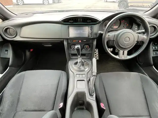 トヨタ ８６ G 埼玉県 2012(平24)年 11.5万km クリスタルブラックシリカ (株)IDOMが運営する【じしゃロン川越店】の自社ローン専用車両になりますこちらは現金またはオートローンご利用時の価格です。自社ローンご希望の方は別途その旨お申付け下さい/純正ナビ/　・AM/FM/　・CD/DVD/　・TV（フルセグ）/　・Bluetooth/　・取扱説明書/バックカメラ/ETC/エアロ（TRD）/社外アルミW/横滑り防止装置/エアバック（W、サイド、カーテン）/電動格納ミラー/ドアバイザー/記録簿