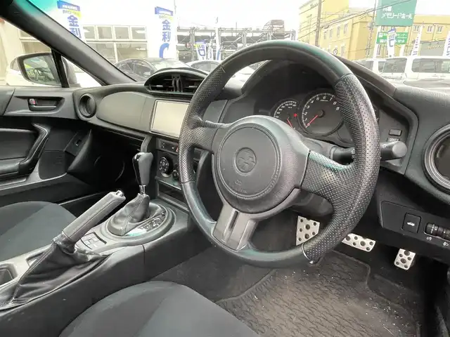トヨタ ８６ G 埼玉県 2012(平24)年 11.5万km クリスタルブラックシリカ (株)IDOMが運営する【じしゃロン川越店】の自社ローン専用車両になりますこちらは現金またはオートローンご利用時の価格です。自社ローンご希望の方は別途その旨お申付け下さい/純正ナビ/　・AM/FM/　・CD/DVD/　・TV（フルセグ）/　・Bluetooth/　・取扱説明書/バックカメラ/ETC/エアロ（TRD）/社外アルミW/横滑り防止装置/エアバック（W、サイド、カーテン）/電動格納ミラー/ドアバイザー/記録簿