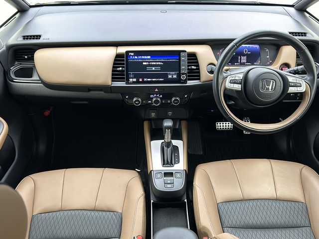 ホンダ フィット リュクス 宮城県 2020(令2)年 1.1万km クリスタルブラックパール 純正9型ナビ/(AM/FM/TV/BT/SD/USB/iPod/CD/DVD)/バックカメラ/ETC/前後ドライブレコーダー/アダプティブクルーズコントロール/ハーフレザー/シートヒーター/プッシュスタート/スマートキー/オートライト/オートマチックハイビーム/LEDヘッドライト/フォグランプ/ヘッドライトレベライザー/純正フロアマット/純正16インチアルミホイール/禁煙車