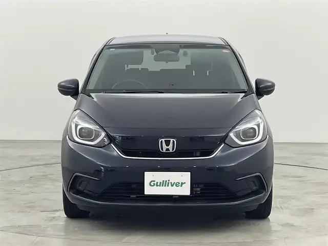 ホンダ フィット e:HEVホーム 福岡県 2021(令3)年 4万km ミッドナイトブルービームM ９型ホンダコネクトナビ（フルセグＴＶ）　/バックカメラ　/ＥＴＣ　/前後ドラレコ　/アダプティブクルーズコントロール　/コーナーセンサー　/衝突被害軽減　/レーンキープ　/踏み間違い防止　/安全支援情報スイッチ　/ＬＥＤ