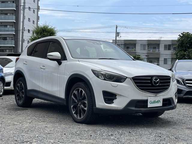 マツダ ＣＸ－５ XD Lパッケージ 東京都 2015(平27)年 5.4万km クリスタルホワイトパールマイカ ワンオーナー/4WD/ターボ/純正HDDナビ/ (フルセグTV/Bluetooth/DVD/USB)/バックカメラ・サイドカメラ/レザーシート/前席パワーシート/前席シートヒーター/i-ACTIVSENSE/・マツダレーダークルーズコントロール（MRCC）/・スマートブレーキサポート（SBS）/・アドバンストスマートシティブレーキサポート（アドバンストSCBS）/・レーンキープアシストシステム＆車線逸脱警報システム（LAS & LDWS）/・ブラインドスポットモニタリング（BSM）/横滑り防止装置/純正19インチアルミホイール/スマートキー/オートライト/純正LEDヘッドライト/純正フロアマット/保証書/取扱説明書