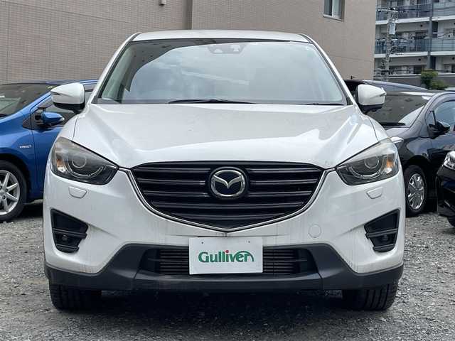 マツダ ＣＸ－５ XD Lパッケージ 東京都 2015(平27)年 5.4万km クリスタルホワイトパールマイカ ワンオーナー/4WD/ターボ/純正HDDナビ/ (フルセグTV/Bluetooth/DVD/USB)/バックカメラ・サイドカメラ/レザーシート/前席パワーシート/前席シートヒーター/i-ACTIVSENSE/・マツダレーダークルーズコントロール（MRCC）/・スマートブレーキサポート（SBS）/・アドバンストスマートシティブレーキサポート（アドバンストSCBS）/・レーンキープアシストシステム＆車線逸脱警報システム（LAS & LDWS）/・ブラインドスポットモニタリング（BSM）/横滑り防止装置/純正19インチアルミホイール/スマートキー/オートライト/純正LEDヘッドライト/純正フロアマット/保証書/取扱説明書
