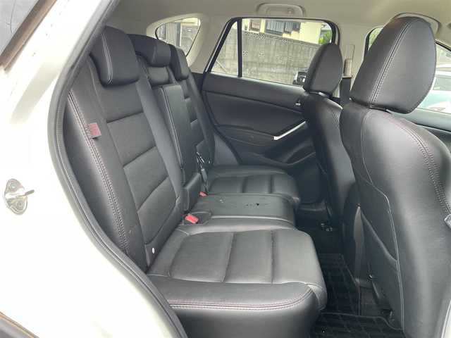 マツダ ＣＸ－５ XD Lパッケージ 東京都 2015(平27)年 5.4万km クリスタルホワイトパールマイカ ワンオーナー/4WD/ターボ/純正HDDナビ/ (フルセグTV/Bluetooth/DVD/USB)/バックカメラ・サイドカメラ/レザーシート/前席パワーシート/前席シートヒーター/i-ACTIVSENSE/・マツダレーダークルーズコントロール（MRCC）/・スマートブレーキサポート（SBS）/・アドバンストスマートシティブレーキサポート（アドバンストSCBS）/・レーンキープアシストシステム＆車線逸脱警報システム（LAS & LDWS）/・ブラインドスポットモニタリング（BSM）/横滑り防止装置/純正19インチアルミホイール/スマートキー/オートライト/純正LEDヘッドライト/純正フロアマット/保証書/取扱説明書