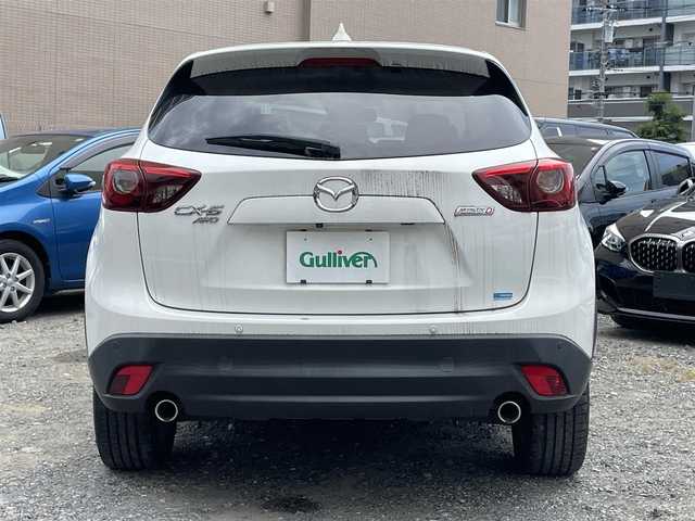 マツダ ＣＸ－５ XD Lパッケージ 東京都 2015(平27)年 5.4万km クリスタルホワイトパールマイカ ワンオーナー/4WD/ターボ/純正HDDナビ/ (フルセグTV/Bluetooth/DVD/USB)/バックカメラ・サイドカメラ/レザーシート/前席パワーシート/前席シートヒーター/i-ACTIVSENSE/・マツダレーダークルーズコントロール（MRCC）/・スマートブレーキサポート（SBS）/・アドバンストスマートシティブレーキサポート（アドバンストSCBS）/・レーンキープアシストシステム＆車線逸脱警報システム（LAS & LDWS）/・ブラインドスポットモニタリング（BSM）/横滑り防止装置/純正19インチアルミホイール/スマートキー/オートライト/純正LEDヘッドライト/純正フロアマット/保証書/取扱説明書