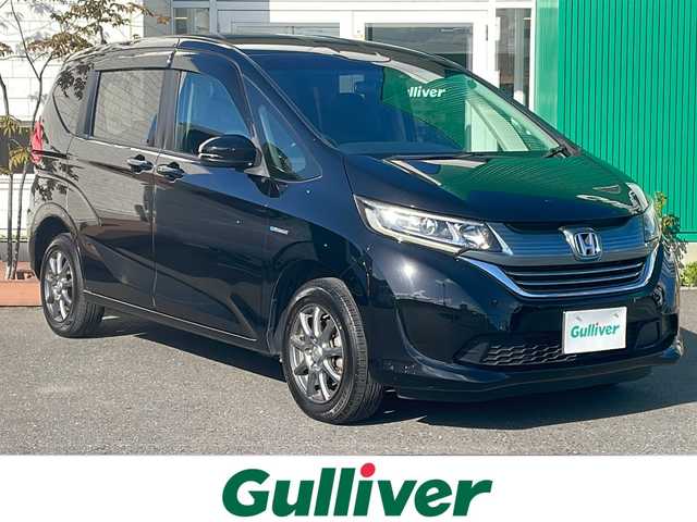 ホンダ フリード＋ ハイブリット G ホンダセンシング 青森県 2019(平31)年 9.2万km プレミアムスパークルブラックパール 4WD/寒冷地仕様/社外SDナビ・フルセグTV/バックカメラ/両側パワースライドドア/前席シートヒーター/衝突軽減ブレーキ/追従クルーズコントロール/レーンキープアシスト/熱線入りフロントウインドウ/純正エンジンスターター/ビルトインETC/後席ロールサンシェード/LEDヘッドライト/社外15インチアルミ