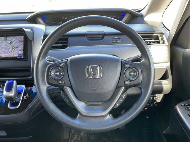 ホンダ フリード＋ ハイブリット G ホンダセンシング 青森県 2019(平31)年 9.2万km プレミアムスパークルブラックパール 4WD/寒冷地仕様/社外SDナビ・フルセグTV/バックカメラ/両側パワースライドドア/前席シートヒーター/衝突軽減ブレーキ/追従クルーズコントロール/レーンキープアシスト/熱線入りフロントウインドウ/純正エンジンスターター/ビルトインETC/後席ロールサンシェード/LEDヘッドライト/社外15インチアルミ