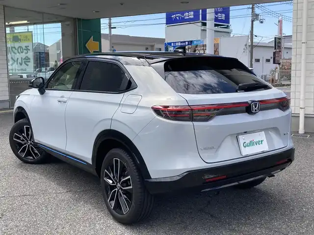 ホンダ ヴェゼル ハイブリッド e:HEV Z PLaYパッケージ 兵庫県 2025(令7)年 0.1千km プレミアムサンライトホワイトパール ワンオーナー/純正ナビ/フルセグTV/Bluetooth/FM/AM/OPマルチビューカメラシステム/OPパノラマルーフ/ビルトインETC2.0/衝突被害軽減ブレーキ/踏み間違い衝突軽減/ブラインドスポットアシスト/路外逸脱抑制機能/アダプティブクルーズコントロール/パワーバックドア/D/Nシートヒーター/ステアリングヒーター/ハーフレザーシート/パドルシフト/前後クリアランスソナー/LEDヘッドライト/フォグランプ/オートライト/シーケンシャルウィンカー/電格ミラー/フロアマット/ISOFIX/スペアキー1本/新車時保証書/取扱説明書