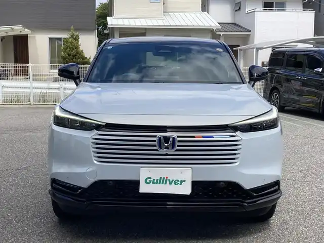 ホンダ ヴェゼル ハイブリッド e:HEV Z PLaYパッケージ 兵庫県 2025(令7)年 0.1千km プレミアムサンライトホワイトパール ワンオーナー/純正ナビ/フルセグTV/Bluetooth/FM/AM/OPマルチビューカメラシステム/OPパノラマルーフ/ビルトインETC2.0/衝突被害軽減ブレーキ/踏み間違い衝突軽減/ブラインドスポットアシスト/路外逸脱抑制機能/アダプティブクルーズコントロール/パワーバックドア/D/Nシートヒーター/ステアリングヒーター/ハーフレザーシート/パドルシフト/前後クリアランスソナー/LEDヘッドライト/フォグランプ/オートライト/シーケンシャルウィンカー/電格ミラー/フロアマット/ISOFIX/スペアキー1本/新車時保証書/取扱説明書