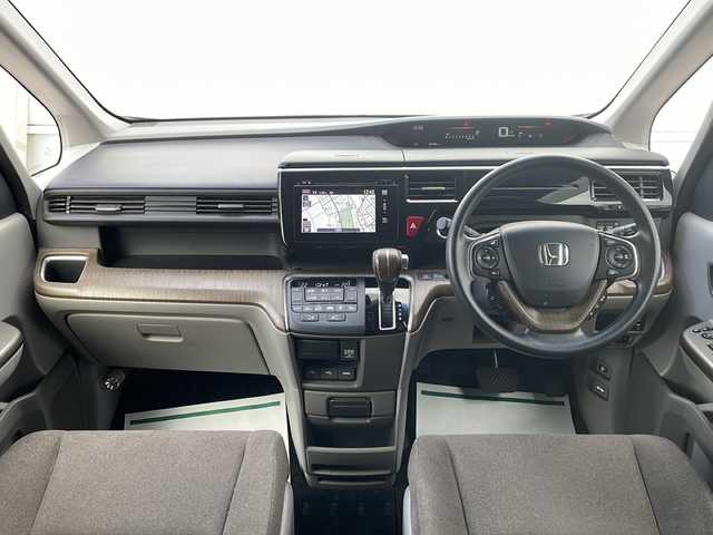 ホンダ ステップワゴン G EX 山形県 2015(平27)年 5.1万km プレミアムディープロッソパール Honda SENSING/・衝突軽減ブレーキ（ＣＭＢＳ）/・路外逸脱抑制機能/・先行車発進お知らせ機能/・アダプティブクルーズコントロール（ＡＣＣ）/・車線維持支援システム（ＬＫＡＳ）/・標識認識機能/・誤発進抑制機能 /両側パワースライドドア/純正フリップダウンモニター/純正ナビ(CD.DVD.SD.BT.USB.HDMI)/フルセグ/マルチビューカメラ/ビルトインETC/シートヒーター/プッシュスタート/スマートキー/LEDヘッドライト