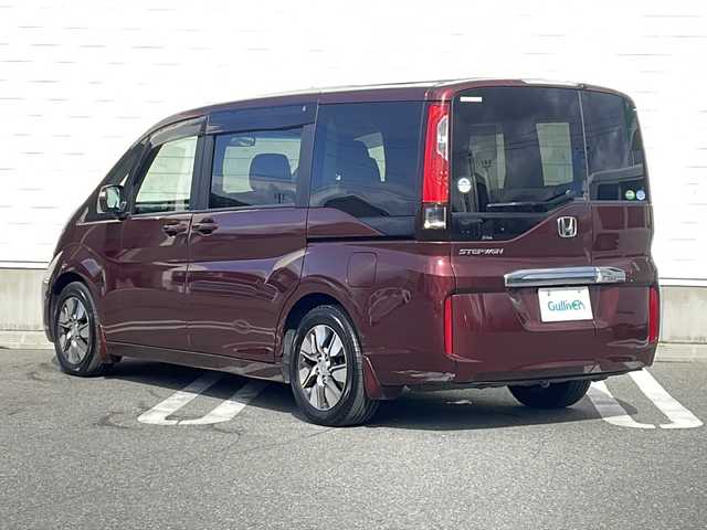 ホンダ ステップワゴン G EX 山形県 2015(平27)年 5.1万km プレミアムディープロッソパール Honda SENSING/・衝突軽減ブレーキ（ＣＭＢＳ）/・路外逸脱抑制機能/・先行車発進お知らせ機能/・アダプティブクルーズコントロール（ＡＣＣ）/・車線維持支援システム（ＬＫＡＳ）/・標識認識機能/・誤発進抑制機能 /両側パワースライドドア/純正フリップダウンモニター/純正ナビ(CD.DVD.SD.BT.USB.HDMI)/フルセグ/マルチビューカメラ/ビルトインETC/シートヒーター/プッシュスタート/スマートキー/LEDヘッドライト