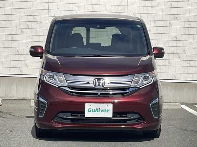 ホンダ ステップワゴン G EX 山形県 2015(平27)年 5.1万km プレミアムディープロッソパール Honda SENSING/・衝突軽減ブレーキ（ＣＭＢＳ）/・路外逸脱抑制機能/・先行車発進お知らせ機能/・アダプティブクルーズコントロール（ＡＣＣ）/・車線維持支援システム（ＬＫＡＳ）/・標識認識機能/・誤発進抑制機能 /両側パワースライドドア/純正フリップダウンモニター/純正ナビ(CD.DVD.SD.BT.USB.HDMI)/フルセグ/マルチビューカメラ/ビルトインETC/シートヒーター/プッシュスタート/スマートキー/LEDヘッドライト