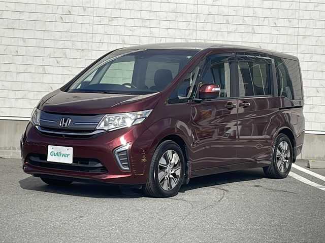 ホンダ ステップワゴン G EX 山形県 2015(平27)年 5.1万km プレミアムディープロッソパール Honda SENSING/・衝突軽減ブレーキ（ＣＭＢＳ）/・路外逸脱抑制機能/・先行車発進お知らせ機能/・アダプティブクルーズコントロール（ＡＣＣ）/・車線維持支援システム（ＬＫＡＳ）/・標識認識機能/・誤発進抑制機能 /両側パワースライドドア/純正フリップダウンモニター/純正ナビ(CD.DVD.SD.BT.USB.HDMI)/フルセグ/マルチビューカメラ/ビルトインETC/シートヒーター/プッシュスタート/スマートキー/LEDヘッドライト