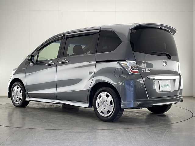 ホンダ フリード ハイブリット ジャストセレクション 宮崎県 2012(平24)年 4.8万km ポリッシュドメタルメタリック 禁煙車/社外オーディオ/（DEH-470）/純正エアロ/純正ルーフエンドスポイラー/純正キセノンオートライト/左側電動スライドドア/クルーズコントロール/オートエアコン/リアプライバシーガラス/電動格納ミラー/取扱い説明書
