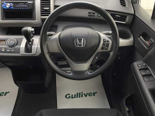 ホンダ フリード ハイブリット ジャストセレクション 宮崎県 2012(平24)年 4.8万km ポリッシュドメタルメタリック 禁煙車/社外オーディオ/（DEH-470）/純正エアロ/純正ルーフエンドスポイラー/純正キセノンオートライト/左側電動スライドドア/クルーズコントロール/オートエアコン/リアプライバシーガラス/電動格納ミラー/取扱い説明書