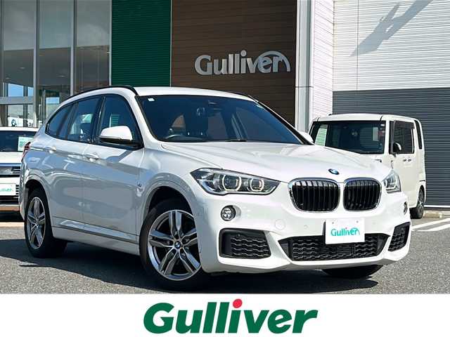 ＢＭＷ Ｘ１ sDrive 18i Mスポーツ 佐賀県 2019(令1)年 5.1万km アルピンホワイトⅢ 純正ナビ/Bluetooth/USB/ワンオーナー/バックカメラ/クルーズコントロール/衝突軽減システム/レーンアシスト/LEDオートライト/オートエアコン/パワーシート/シートメモリ/ヒートシーター/クリアランスソナー/MTモード付AT/アイドリングストップ/ETC/プッシュスタート/ステアリングスイッチ/電格ウィンカーミラー/保証書/取扱説明書/記録簿(R2/3/4/6)