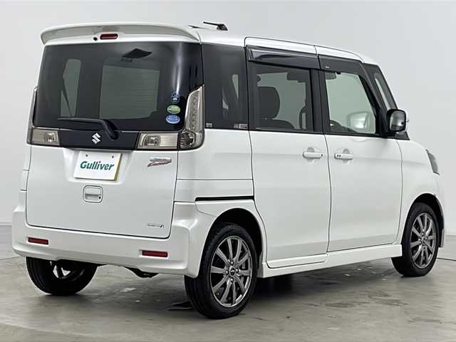 スズキ スペーシア カスタム XS リミテッド 道央・札幌 2015(平27)年 3.9万km クリスタルホワイトP ・4WD/・寒冷地仕様/・純正ナビ&CD&AUX&ワンセグ/・両側パワースライドドア/・衝突軽減ブレーキ/・前席シートヒーター/・ドアミラーヒーター/・ステアリングスイッチ/・ベンチシート/・HIDヘッドライト/・フォグランプ/・社外AW付スタッドレス積載