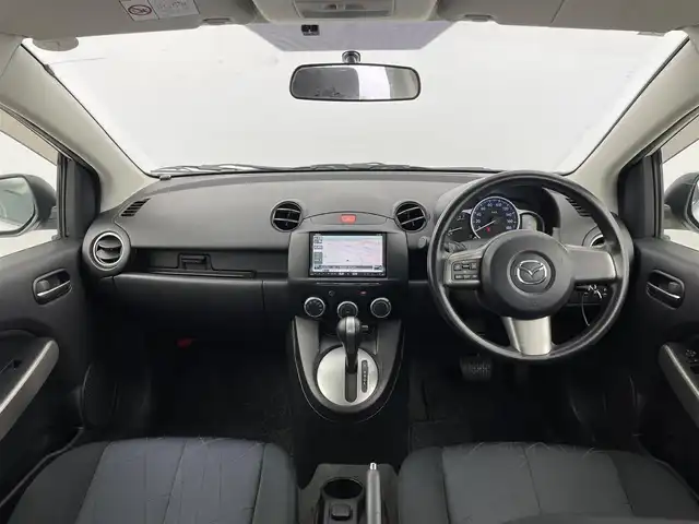 マツダ デミオ 13－スカイアクティブ 愛知県 2013(平25)年 3.7万km クリスタルホワイトパールマイカ ／禁煙車/／Clarion製ＨＤＤナビ(MAX670)/／ＣＤ　ＤＶＤ　ＨＤＤ　地デジ/／バックカメラ/／ETC/／リモコンキー/／純正フロアマット/／純正ドアバイザー/／電動格納ウインカーミラー/／アイドリングストップ/／取扱説明書/／ステアリングボタン