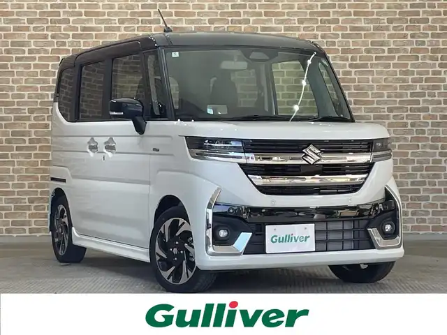 スズキ スペーシア カスタム HYBRID XS 岩手県 2024(令6)年 0.1万km ピュアホワイトパール/ブラック2トーン ４WD/オプション ブラック2トーンルーフ/スリムサーキュレーター/ロールサンシェード/前席シートヒーター/ステアリングヒーター/マルチユースフラップ/両側パワースライドドア/スズキセーフティサポート/デュアルセンサーブレーキサポートII/車線逸脱抑制機能/アダプティブクルーズコントロール/車線維持支援機能/誤発進抑制機能/標識認識機能/先行車発信お知らせ機能/リヤパーキングセンサー/ハイビームアシスト/横滑り防止装置/アイドリングストップ/LEDヘッドライト/純正１５インチアルミホイール