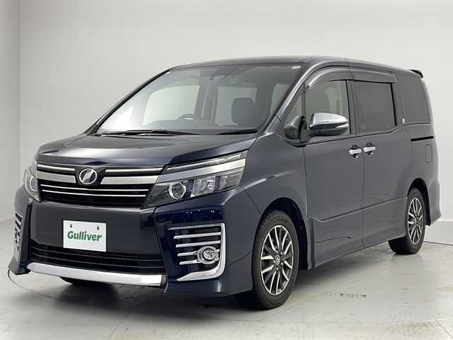 トヨタ ヴォクシー ZS 煌Ⅱ 茨城県 2017(平29)年 6.9万km ブラッキッシュアゲハガラスフレーク 純正１０型ナビ　フルセグＴＶ　バックモニター　衝突軽減ブレーキ　両側電動スライドドア　ＬＥＤライト　ＬＥＤフォグランプ　ＥＴＣ　ドライブレコーダー　スマートキー　横滑り防止装置　純正アルミホイール