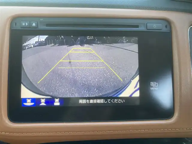 ホンダ ヴェゼル ハイブリッド Z 埼玉県 2015(平27)年 12.1万km ミスティックグリーンパール (株)IDOMが運営する【じしゃロン鳩ヶ谷店】の自社ローン専用車両になりますこちらは現金またはオートローンご利用時の価格です。自社ローンご希望の方は別途その旨お申付け下さい/登録時120615km/純正メモリナビ/フルセグTV/バックカメラ/クルーズコントロール/電子制御パーキングブレーキ/ブレーキホールドスイッチ/横滑り防止装置/衝突被害軽減システム/MTモード付AT/パドルシフト/プッシュスタート/スマートキー/ECON/ビルトインETC/USBポート/ハーフレザーシート/前席シートヒーター/革巻きステアリング/ステアリングリモコン/ダブル/サイド/カーテンエアバッグ/オートライト/純正LEDヘッドライト/純正17インチAW/ドアバイザー/フロントフォグランプ/ルーフレール/電動格納機能付きウインカーミラー