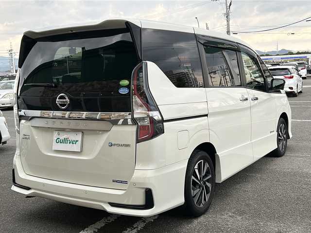 日産 セレナ e－パワー ハイウェイスター V 徳島県 2020(令2)年 8.3万km ブリリアントホワイトパール 10型純正ナビ　/（BT/フルセグ/DISC/ラジオ）/全周囲カメラ/プロパイロット/フリップダウンモニター/ビルトインETC/両側電動スライドドア/オートブレーキホールド/自動パーキングブレーキ/クルーズコントロール/ドライブレコーダー/両側電動スライドドア/純正フロアマット/自動パーキングブレーキ/LEDヘッドライト/純正16インチアルミホイール/パーキングアシスト/ドアバイザー/スペアキー/取扱説明書/新車時保証書