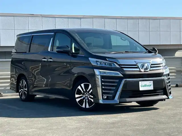 トヨタ ヴェルファイア Z Gエディション 静岡県 2019(平31)年 7.1万km グラファイトM トヨタセーフティーセンス/7人乗り/純正10インチナビ/FM/AM/CD/DVD/Bluetooth/SD/フルセグTV/クルーズコントロール/バックカメラ/ビルトインETC/両側電動スライドドア/LEDヘッドライト/オートライト/オートハイビーム/デジタルインナーミラー/ステアリングヒーター/全席パワーシート/メモリーシート/プッシュスタート/スマートキー/オットマン/純正18AW