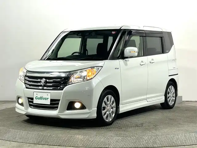 スズキ ソリオ HV MZ 大阪府 2018(平30)年 1.1万km ピュアホワイトP 純正８ｉｎｃナビＴＶ　３６０カメラ　両側パワースライドドア　レーダーＣ　衝突軽減Ｂ　レーンアシスト　シートヒーター　クリアランスソナー　キセノンライト