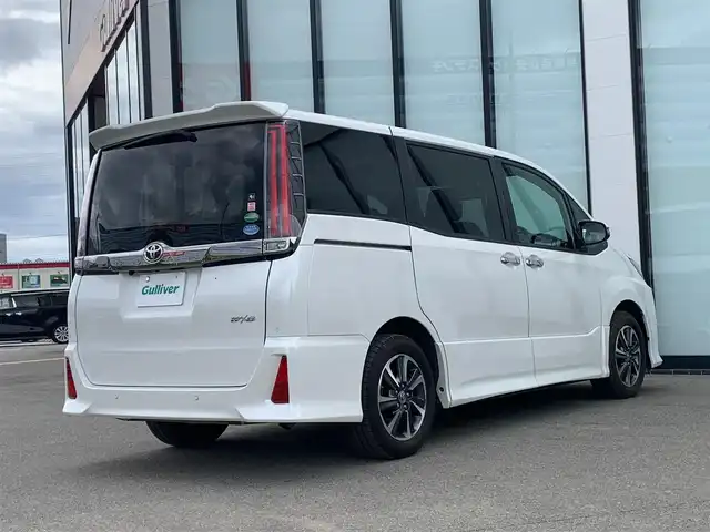 トヨタ ノア Si ダブルバイビー 大阪府 2020(令2)年 3.4万km ホワイトパールクリスタルシャイン 社外９インチナビ/   フルセグTV/CD/DVD/Bluetooth/衝突軽減/バックモニター/両側パワースライドドア/クルーズコントロール/アイドリングストップ/横滑り防止装置/ドライブレコーダー/コーナーセンサー/ハーフレザーシート/オートマチックハイビーム/純正16インチアルミホイール/純正フロアマット/プッシュスタート/スマートキー/ＥＴＣ/ＬＥＤライト
