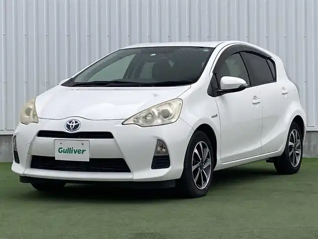 トヨタ アクア G 香川県 2014(平26)年 5.5万km スーパーホワイトⅡ 登録時走行距離：54894km/ディーラー純正ナビ/モデリスタ15インチアルミ/前後ドライブレコーダー/ETC/シートヒーター/ドアバイザー/純正フロアマット/電動格納ウィンカーミラー/オートライト/レベライザヘッドライト/プッシュスタート/スマートキー/スペアキー