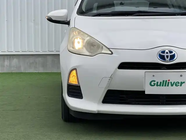 トヨタ アクア G 香川県 2014(平26)年 5.5万km スーパーホワイトⅡ 登録時走行距離：54894km/ディーラー純正ナビ/モデリスタ15インチアルミ/前後ドライブレコーダー/ETC/シートヒーター/ドアバイザー/純正フロアマット/電動格納ウィンカーミラー/オートライト/レベライザヘッドライト/プッシュスタート/スマートキー/スペアキー