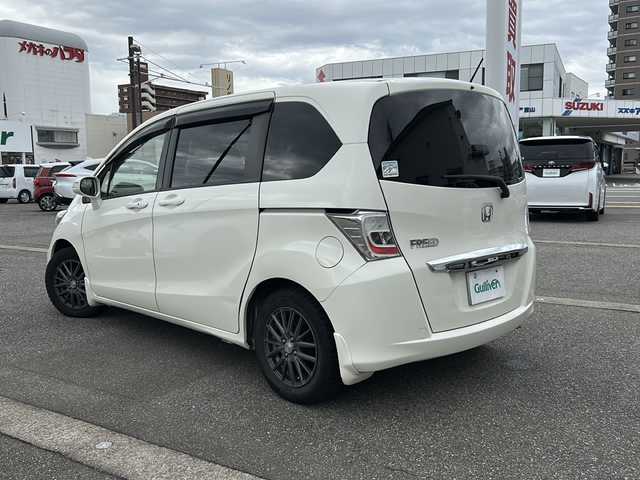 ホンダ フリード G ジャストセレクション 富山県 2013(平25)年 10.3万km プレミアムホワイトパール ワンオーナー/スマートキー×２/両側パワースライドドア/社外メモリーナビ(NR-MZ50)/DVD/MSV/DVD/フルセグTV/ETC/クルーズコントロール/電格ウィンカーミラー/HIDヘッドライト/純正フロアマット/純正マッドガード/ドアバイザー/ステアリングスイッチ/保証書・取説・ナビ取説/社外AWノーマルタイヤ車載(185/65R15)