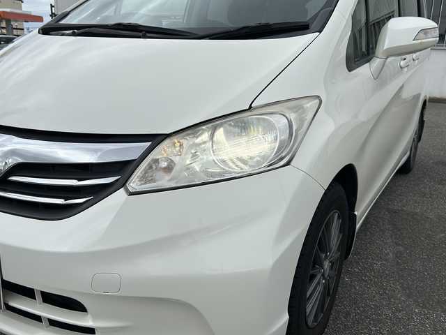 ホンダ フリード G ジャストセレクション 富山県 2013(平25)年 10.3万km プレミアムホワイトパール ワンオーナー/スマートキー×２/両側パワースライドドア/社外メモリーナビ(NR-MZ50)/DVD/MSV/DVD/フルセグTV/ETC/クルーズコントロール/電格ウィンカーミラー/HIDヘッドライト/純正フロアマット/純正マッドガード/ドアバイザー/ステアリングスイッチ/保証書・取説・ナビ取説/社外AWノーマルタイヤ車載(185/65R15)