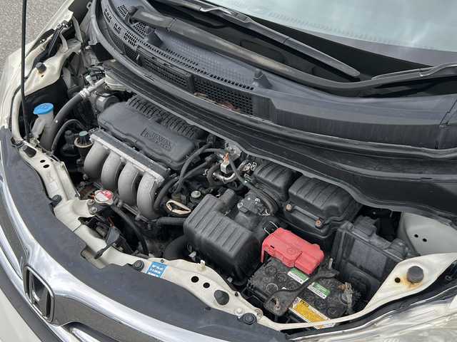 ホンダ フリード G ジャストセレクション 富山県 2013(平25)年 10.3万km プレミアムホワイトパール ワンオーナー/スマートキー×２/両側パワースライドドア/社外メモリーナビ(NR-MZ50)/DVD/MSV/DVD/フルセグTV/ETC/クルーズコントロール/電格ウィンカーミラー/HIDヘッドライト/純正フロアマット/純正マッドガード/ドアバイザー/ステアリングスイッチ/保証書・取説・ナビ取説/社外AWノーマルタイヤ車載(185/65R15)
