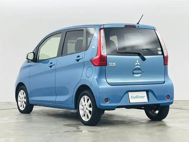 三菱 ｅＫワゴン G e－アシスト 福島県 2014(平26)年 8万km ブリリアントターコイズM Ｅ－アシスト　/・衝突被害軽減システム/メモリナビゲーション/・型番：AVN135MW　/バックカメラ　/アイドリングストップ　/革巻きステアリング　/プッシュスタート　/・スマートキー　/ヘッドライトレベライザー　/・フォグライト　/純正フロアマット　/電動格納ミラー/取扱説明書/・保証書
