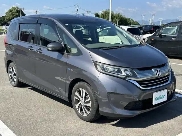 ホンダ フリード ハイブリット G ホンダセンシング 佐賀県 2018(平30)年 8.4万km モダンスティールM /純正SDナビ≪VXM-185VFi≫//バックカメラ//フルセグTV/DVD/Bluetooth///純正フリップダウンモニター≪VM-185EN≫//両側パワースライドドア//ハーフレザーシート//前後ドライブレコーター//スマートキー//スペアキー//ETC//純正フロアマット//純正ドアバイザー//ホンダセンシング//CMBS警報//ACC≪アダプティブオートクルーズコントロール≫//先行車発進お知らせ//路外逸脱抑制システム//レーンキープアシスト//標識認識機能