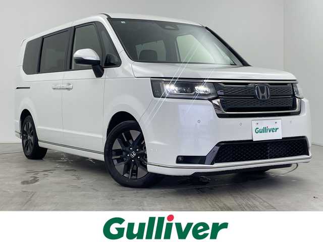 ホンダ ステップワゴン スパーダ eHEV 三重県 2023(令5)年 2万km プラチナホワイトパール /純正11.4インチナビ//フルセグ//バックカメラ//パワーバックドア//シートヒーター//追従式クルーズコントロール//衝突軽減ブレーキ//レーンキープアシスト//ブラインドスポットモニター//オートハイビーム//コーナーセンサー//両側パワースライドドア//ETC//スマートキー