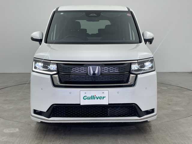 ホンダ ステップワゴン スパーダ eHEV 三重県 2023(令5)年 2万km プラチナホワイトパール /純正11.4インチナビ//フルセグ//バックカメラ//パワーバックドア//シートヒーター//追従式クルーズコントロール//衝突軽減ブレーキ//レーンキープアシスト//ブラインドスポットモニター//オートハイビーム//コーナーセンサー//両側パワースライドドア//ETC//スマートキー