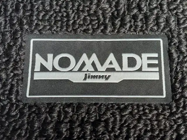 スズキ ジムニー ノマド FC 東京都 2025(令7)年 0.1千km 紺 登録済未使用車/4WD/スズキセーフティサポート/・デュアルカメラブレーキサポート/・車線逸脱警報機能/・誤発進抑制機能/・後方誤発進抑制機能/・ふらつき警報機能/・アダプティブクルーズコントロール/シートヒーター(D/N席)/純正LEDヘッドライト/フォグランプ/オートライト/純正15インチAW/純正フロアマット/革巻きステアリング/ステアリングスイッチ/ヒルホールドコントロール/プッシュスタート/スマートキー/スペアキー×１