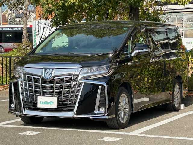 トヨタ アルファードハイブリット SR 宮城県 2019(令1)年 7.1万km ブラック 4WD/オットマン/トヨタセーフティーセンス/・ブラインドスポットモニター/・車線逸脱警報装置/・プリクラッシュセーフティ/・レーントレーシングアシスト/・レーンチェンジアシスト/・ロードサインアシスト/純正ナビ/・ETC/・フルセグTV/・Bluetooth/CD/DVD/・バックカメラ/・デジタルインナーミラー/両側パワースライドドア/パワーバックドア/レーダークルーズコントロール/電子パーキング/・オートホールド/アイドリングストップ/電子パーキング/・オートブレーキホールド/革巻きステアリング/・ステアリングスイッチ/レザーシート/・パワーシート（運転席/助手席）/・メモリシート(運転席)/・エアシート（運転席/助手席）/・シートヒーター（運転席/助手席）/プッシュスタート/・スマートキー/LEDヘッドライト/・オートライト/・オートハイビーム/純正フロアマット