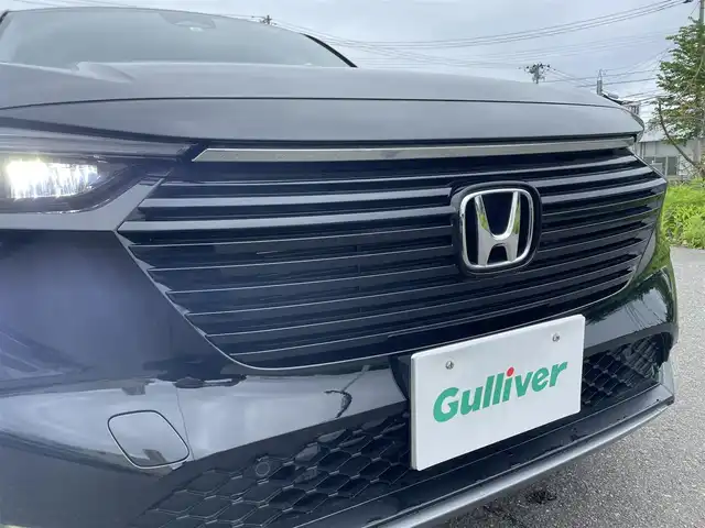 ホンダ ヴェゼル G 山形県 2023(令5)年 1.3万km クリスタルブラックパール 4WD/ホンダセンシング/純正ナビ/　【USB BT スマートフォン連動】/フルセグTV/バックカメラ/ETC2.0/ステアリングスイッチ/レーダークルーズコントロール/シートヒーター/ミラーヒーター/コーナーセンサー/ダウンヒルアシスト/アイドリングストップ/LEDライト/フォグランプ/ウィンカーミラー/純正フロアマット