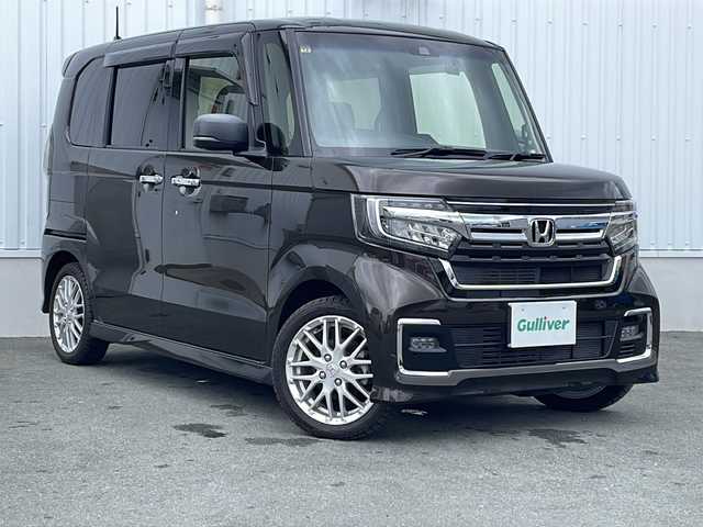 ホンダ Ｎ ＢＯＸ カスタム L ターボ 三重県 2020(令2)年 4.2万km プレミアムグラマラスブロンズP 純正9インチナビ、フルセグTV/純正CD、DVD再生、Bluetooth/両側パワースライドドア/レーダークルーズコントロール/衝突被害軽減ブレーキ/レーンキープアシスト/前席シートヒーター/ハーフレザーシート/ドライブレコーダー/バックカメラ/パドルシフト/純正アルミ15インチ/スマートキー/スペアキー/プッシュスタート/コーナーセンサー/ウィンカーミラー/ビルトインETC/LEDライト/電動格納ミラー/USB給電/フロアマット/ドアバイザー/ステアリングスイッチ/カーテンエアバック/横滑り防止装置
