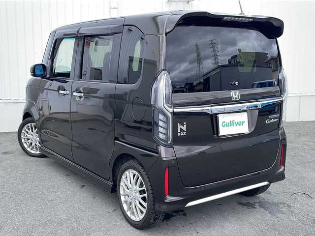 ホンダ Ｎ ＢＯＸ カスタム L ターボ 三重県 2020(令2)年 4.2万km プレミアムグラマラスブロンズP 純正9インチナビ、フルセグTV/純正CD、DVD再生、Bluetooth/両側パワースライドドア/レーダークルーズコントロール/衝突被害軽減ブレーキ/レーンキープアシスト/前席シートヒーター/ハーフレザーシート/ドライブレコーダー/バックカメラ/パドルシフト/純正アルミ15インチ/スマートキー/スペアキー/プッシュスタート/コーナーセンサー/ウィンカーミラー/ビルトインETC/LEDライト/電動格納ミラー/USB給電/フロアマット/ドアバイザー/ステアリングスイッチ/カーテンエアバック/横滑り防止装置