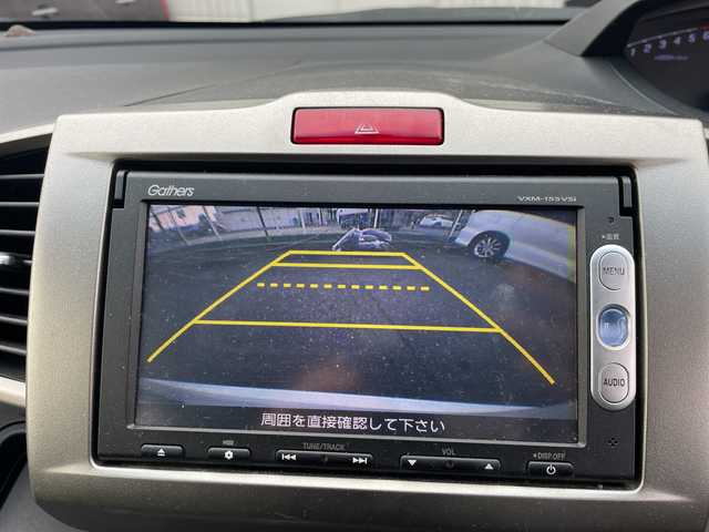 ホンダ フリード スパイク ハイブリット 神奈川県 2015(平27)年 10万km ホワイトオーキッドパール ワンオーナー/純正ナビ/ワンセグテレビ/BT/バックカメラ/クルーズコントロール/ステアリングスイッチ/ETC/電動格納ミラー/フロアマット