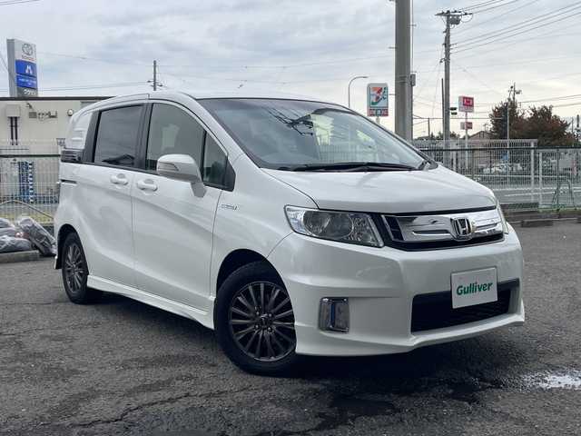 ホンダ フリード スパイク ハイブリット 神奈川県 2015(平27)年 10万km ホワイトオーキッドパール ワンオーナー/純正ナビ/ワンセグテレビ/BT/バックカメラ/クルーズコントロール/ステアリングスイッチ/ETC/電動格納ミラー/フロアマット